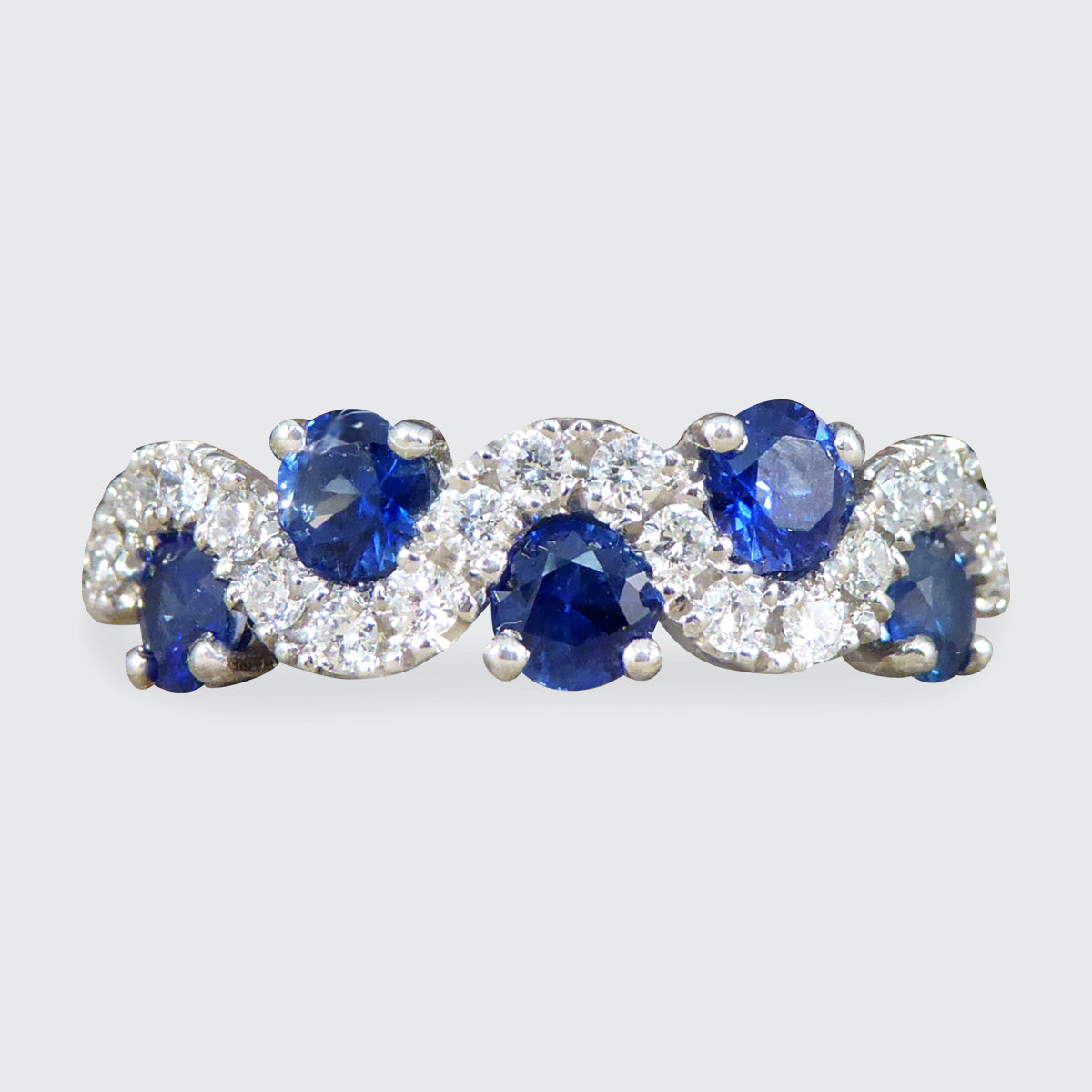 Ceylon Sapphire and Diamond Lazy River Ring in Platinum - Wharfedale Antiques
