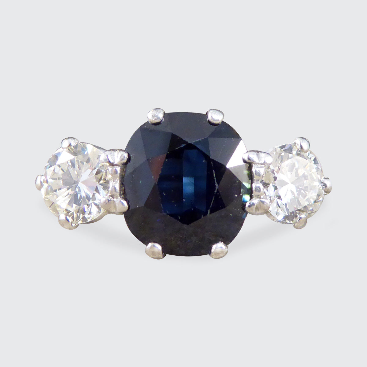 C1920s Deep Sapphire and Diamond Trilogy Ring in 18ct White Gold and Platinum - Wharfedale Antiques
