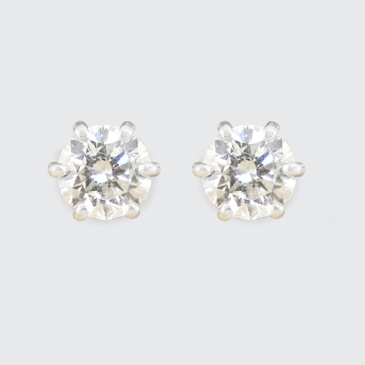 A pair of diamond stud earrings with GIa certs