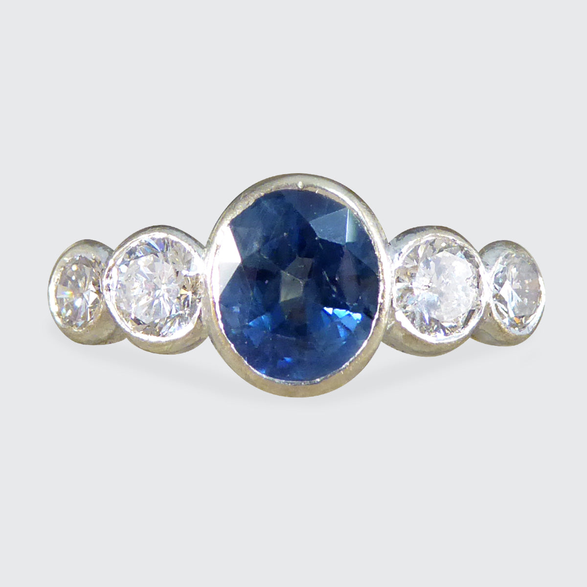 Edwardian Sapphire and Diamond Bezel Set Five Stone Ring in 18ct White and Yellow Gold - Wharfedale Antiques