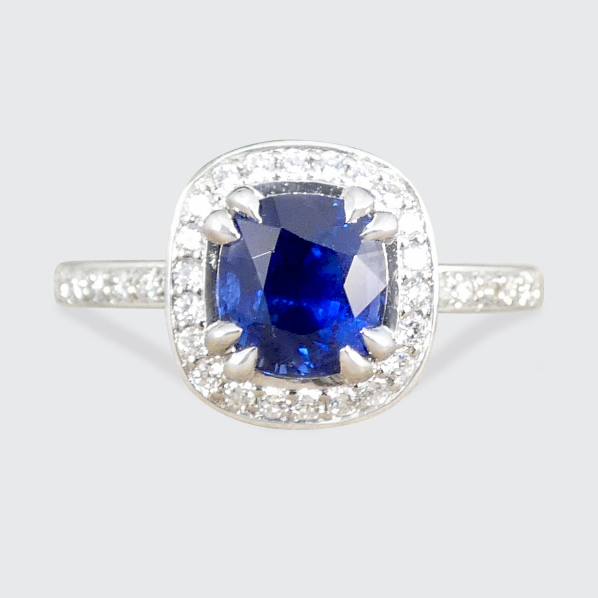 Sapphire and Diamond Halo Cluster Ring in Platinum