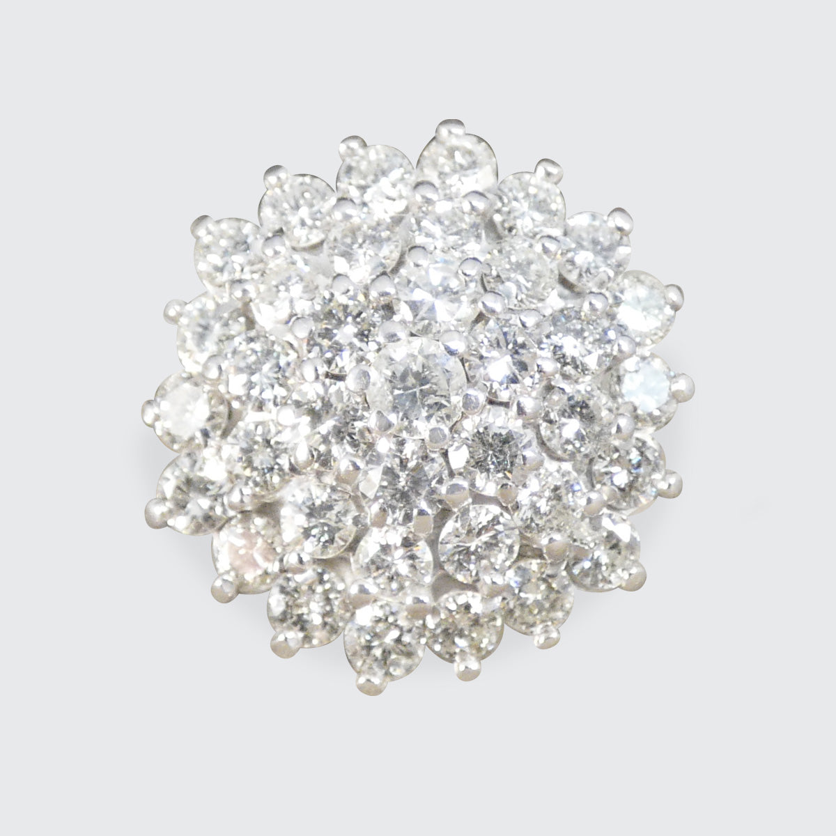 A diamond flower cluster ring