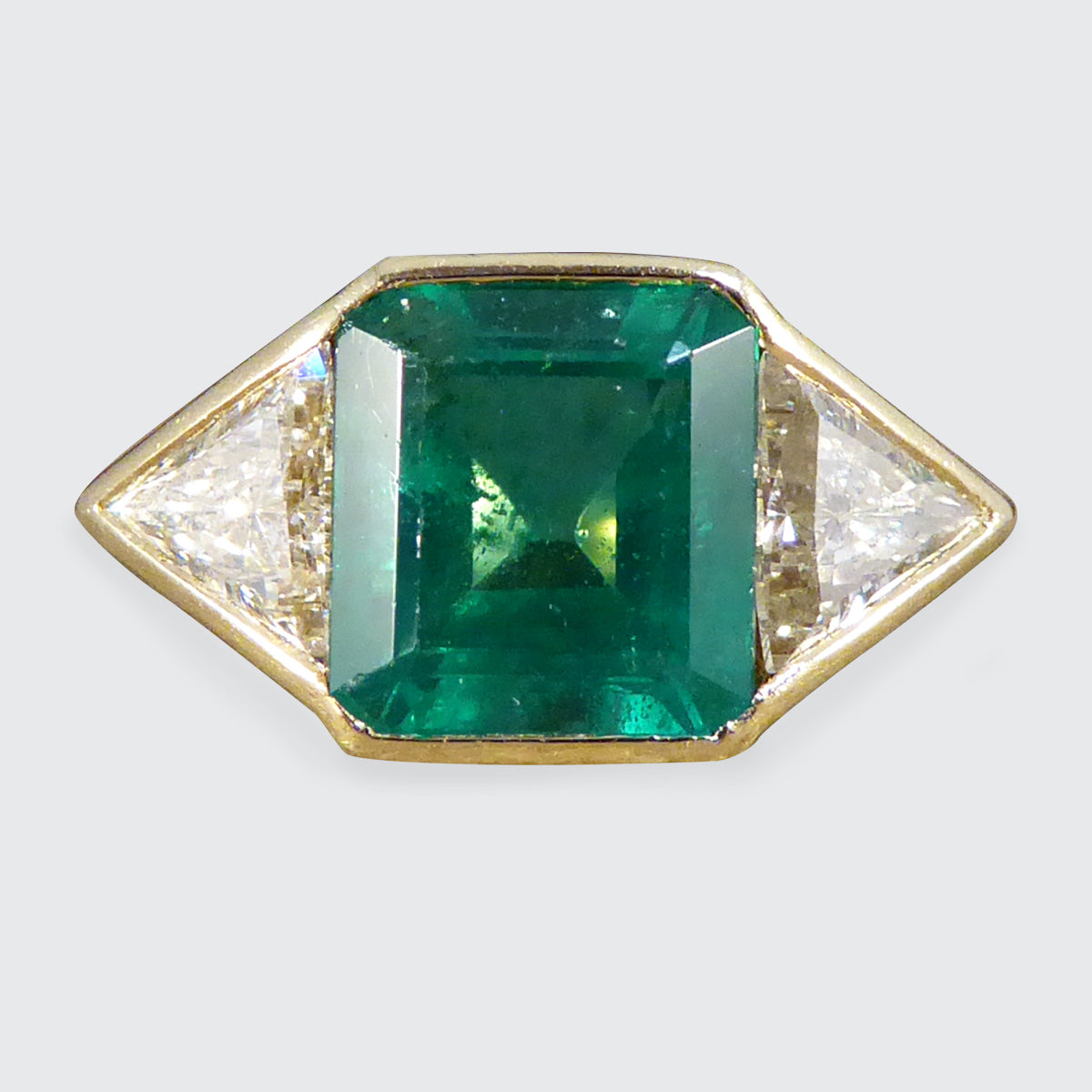 Vintage Emerald and Trillian Cut Diamond Three Stone in 18ct Yellow Gold - Wharfedale Antiques