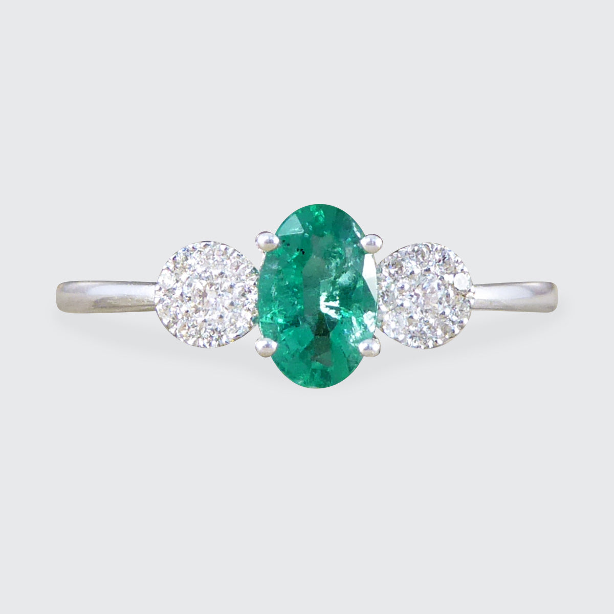 Emerald and Diamond Illusion Three Stone Ring in 18ct White Gold - Wharfedale Antiques