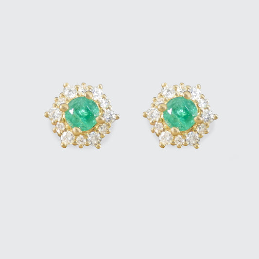 Emerald and Diamond flower cluster stud earrings on a plain white background