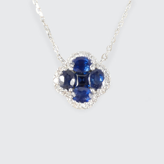 A sapphire and diamond cluster clover necklace