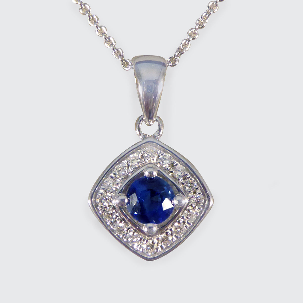 Ceylon Sapphire and Diamond Cluster Pendant Necklace in White Gold