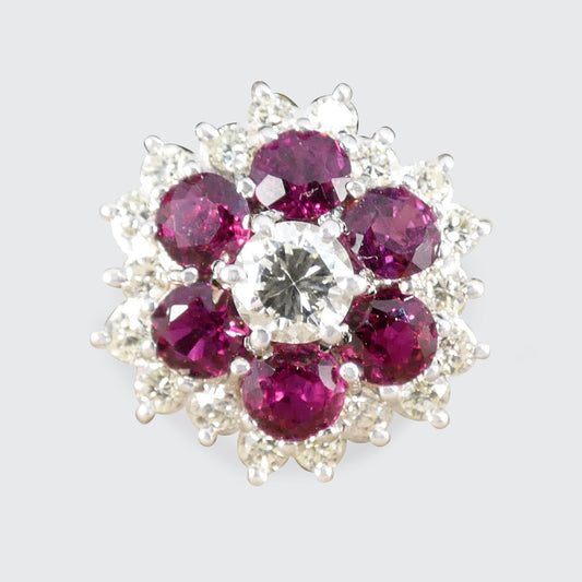 A Ruby and Diamond flower double cluster ring in 18ct yellow gold.