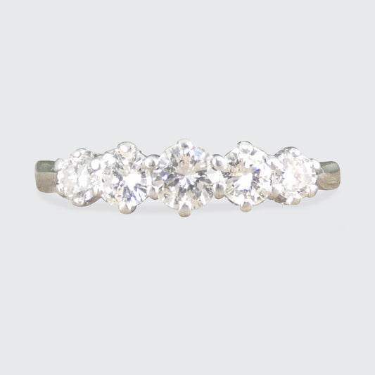 A graduated diamond five stone ring in 18ct white gold
