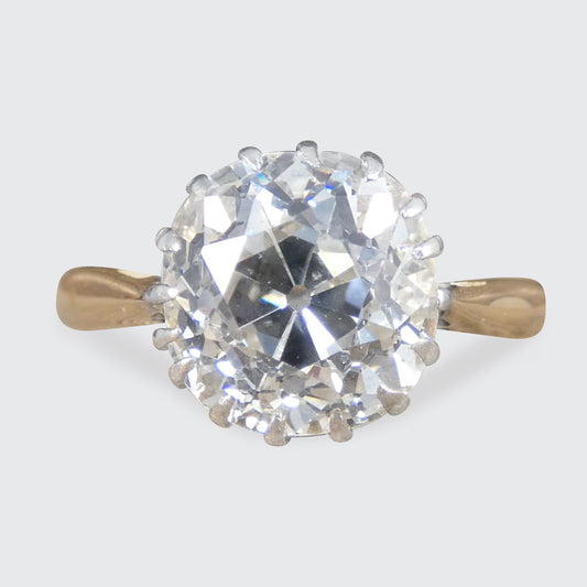 An old mine cut diamond solitaire in Gold