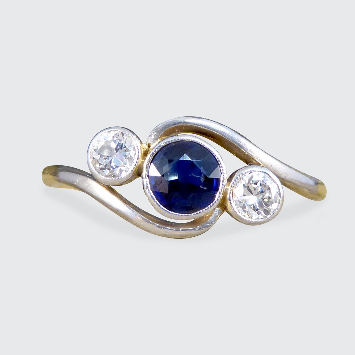 Edwardian Sapphire & Diamond Three Stone Crossover Ring in 18ct Gold and Platinum - Wharfedale Antiques