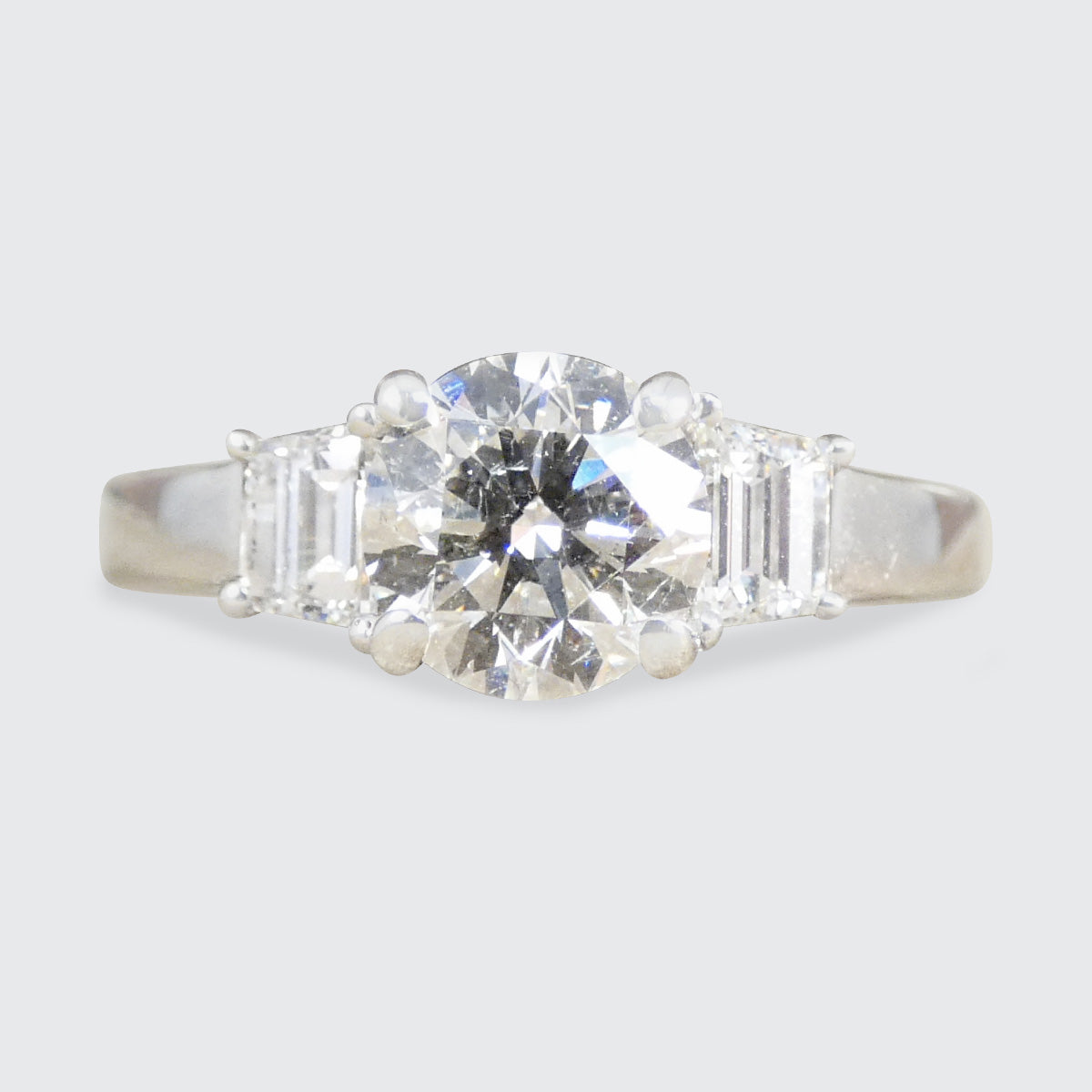 A diamond three stone engagement ring
