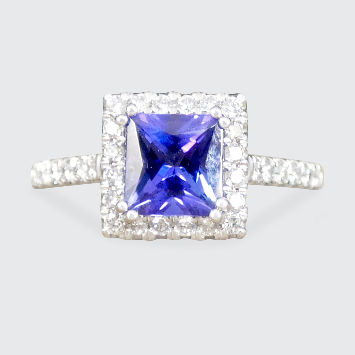 Tanzanite and Diamond square cluster ring with diamond shoulders in platinum