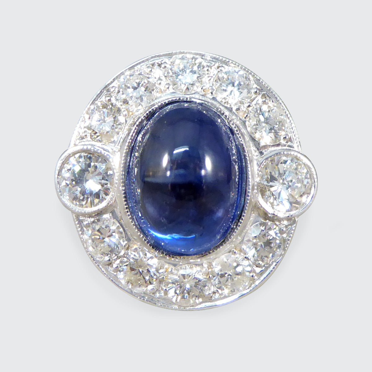 Cabochon Cut Sapphire and Diamond Cluster Ring in 18ct Gold