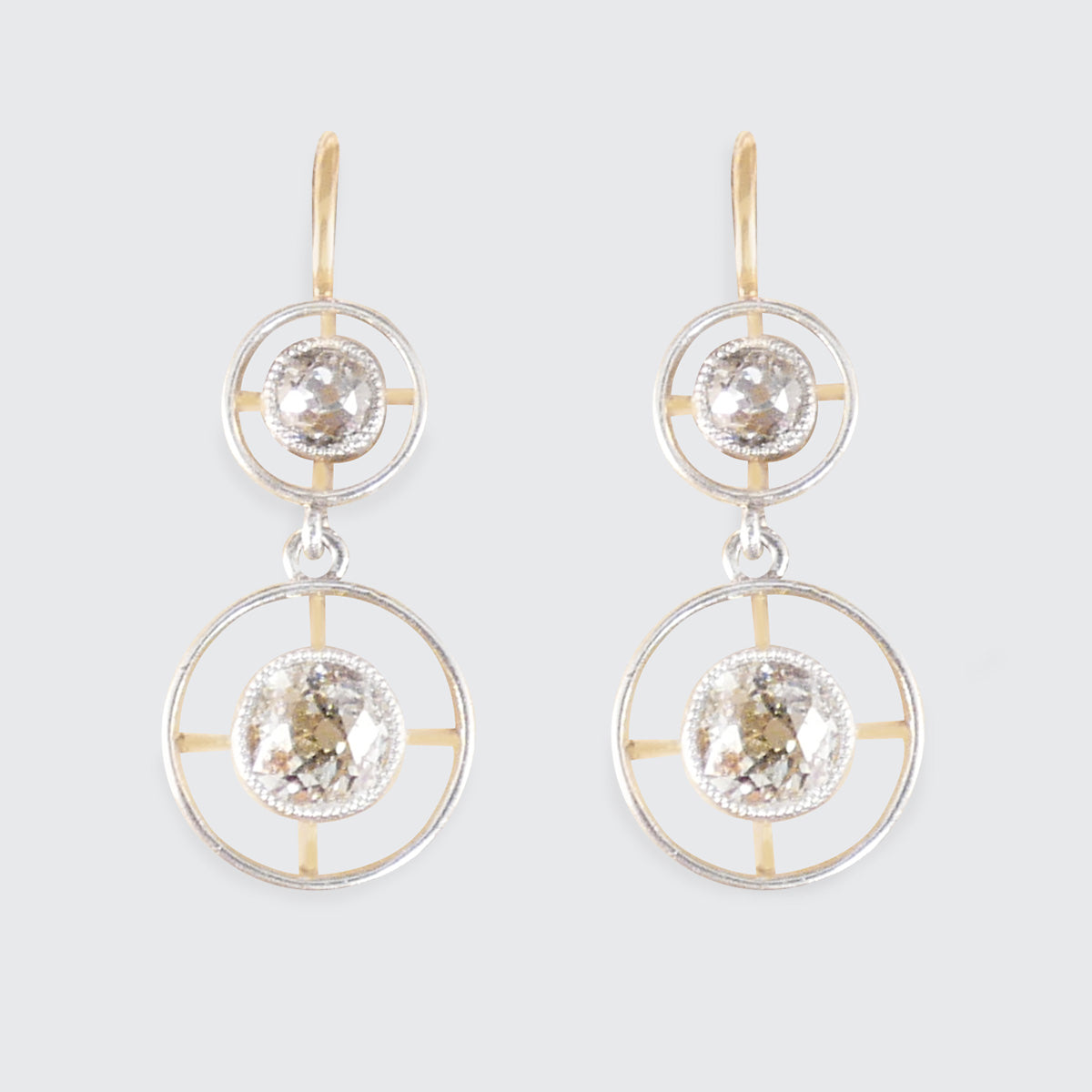 A pair of antique diamond drop earrings in yellow gold and platinum