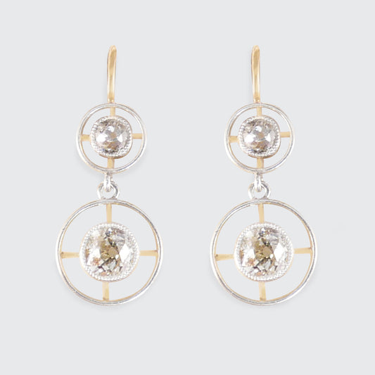 A pair of antique diamond drop earrings in yellow gold and platinum