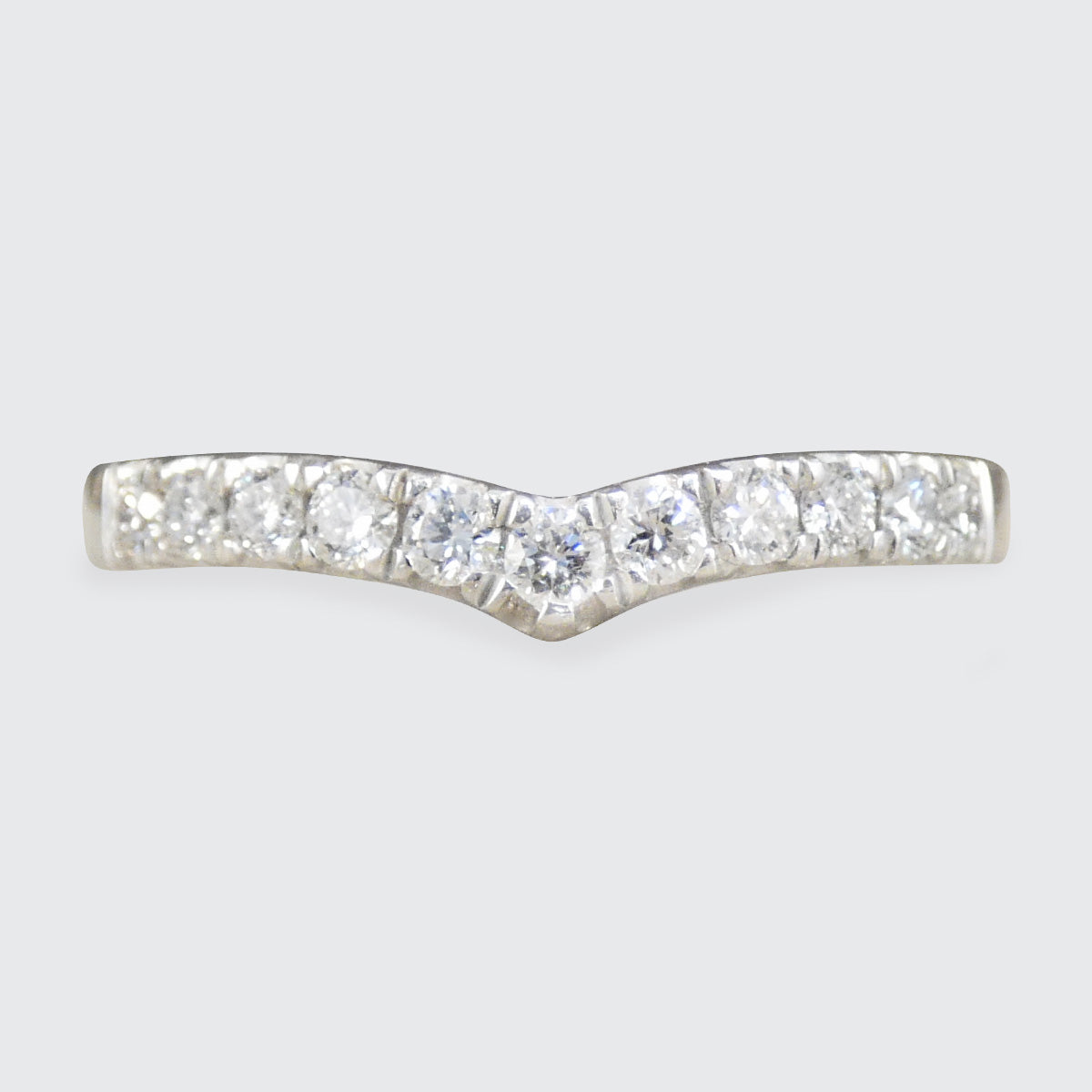 A diamond set wishbone ring in Platinum.