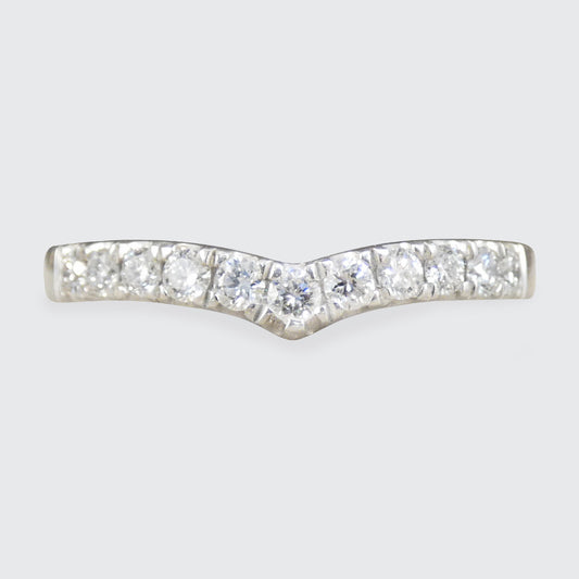 A diamond set wishbone ring in Platinum.