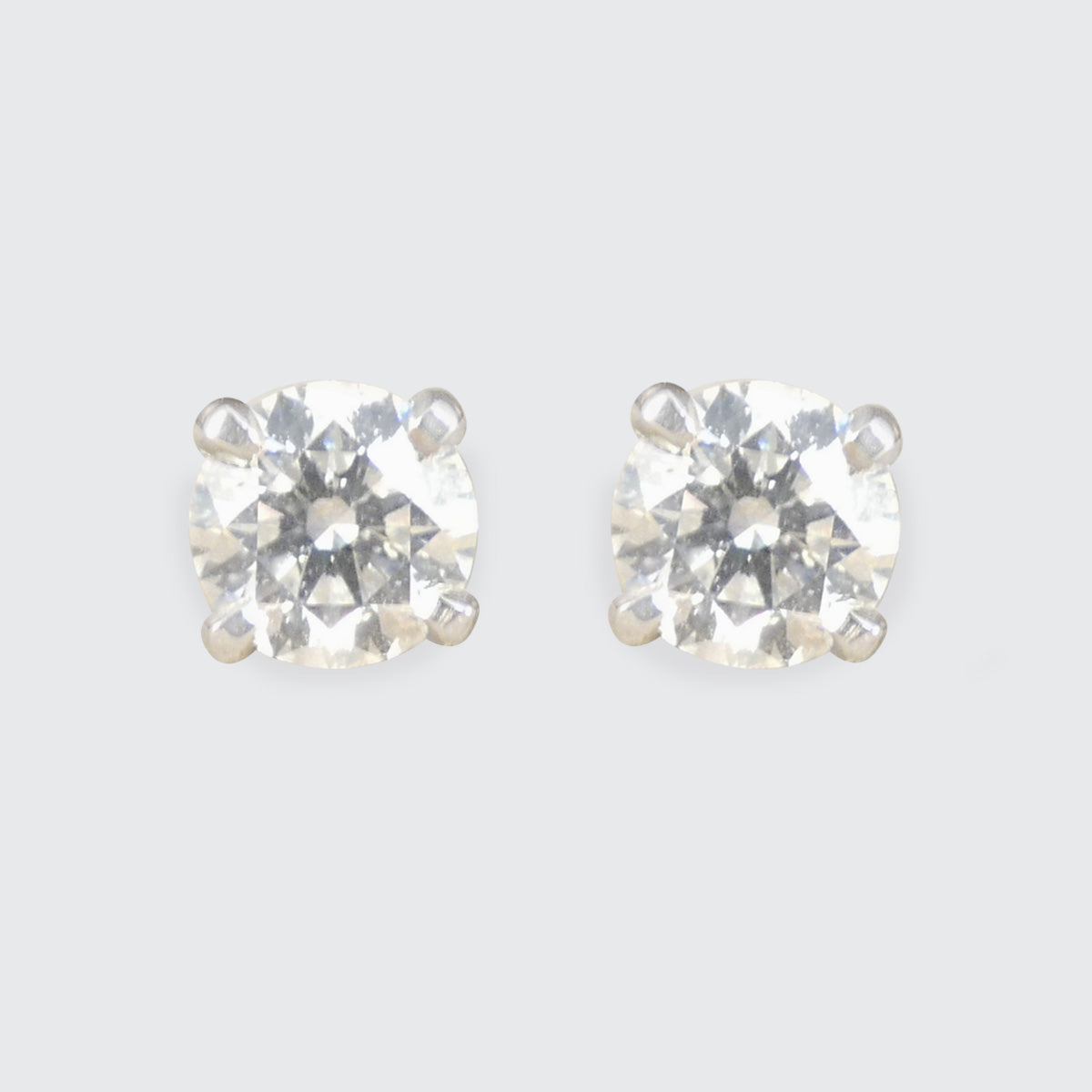 Diamond stud earrings in a four claw platinum setting
