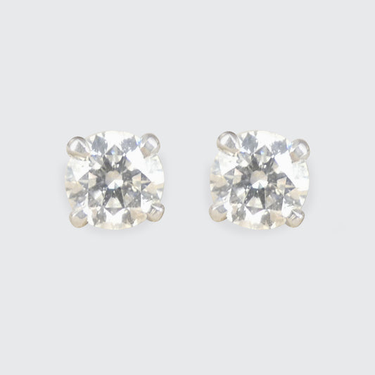 Diamond stud earrings in a four claw platinum setting