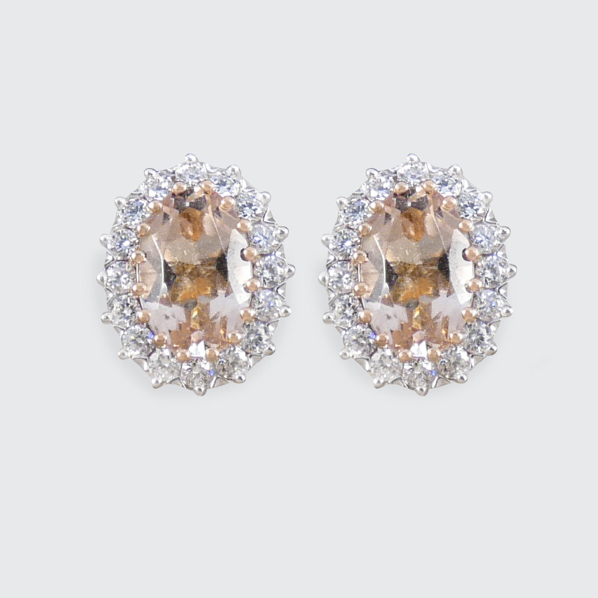 A pair of Morganite and Diamond Cluster Earrings in 18ct Rose Gold