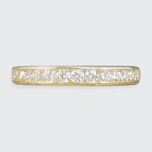 Channel Set Brilliant Cut Diamond Half Eternity Ring in Yellow Gold