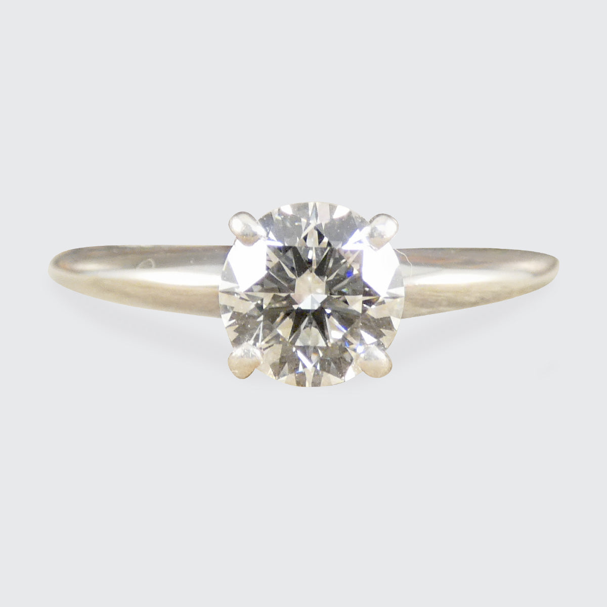 A diamond solitaire ring on white gold
