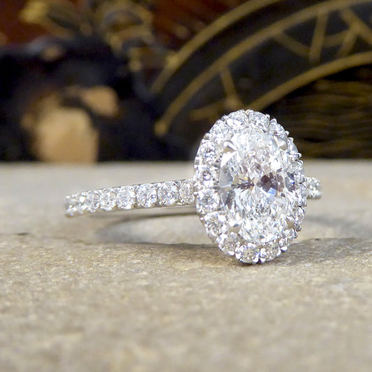 GIA D Colour Oval Cut Diamond Cluster ring with Diamond Shoulders in Platinum - Wharfedale Antiques