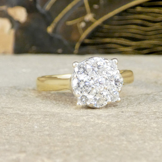 Diamond ring on a textured surface with a blurred decorative background