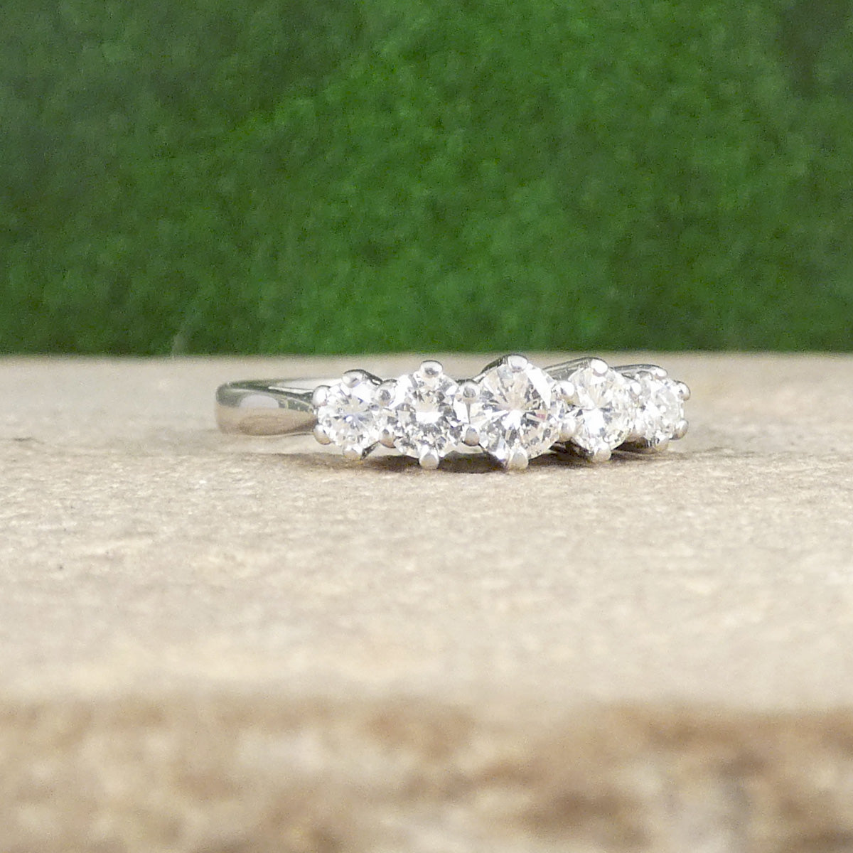 A diamond five stone ring in claw setting