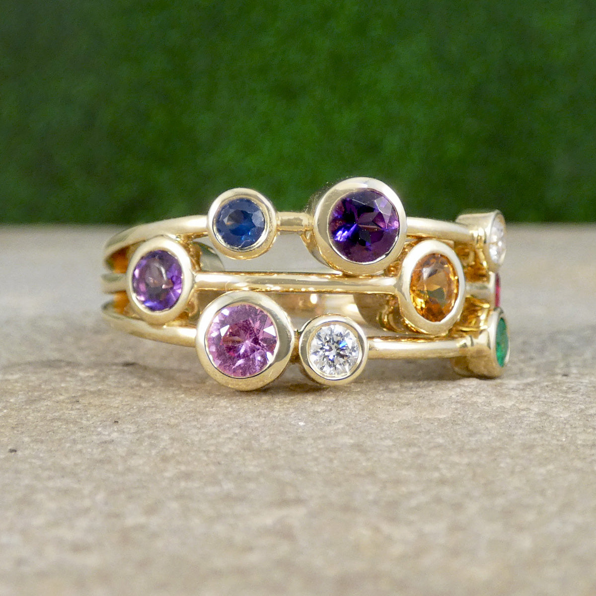 Multi Gem set bubble ring in yellow gold full of colour 