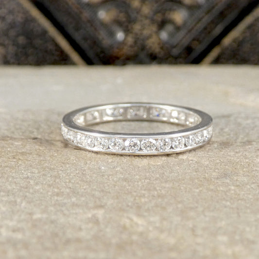 Platinum and Diamond ring with full channel setting.