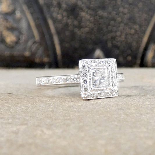Silver ring with a diamond on a textured surface