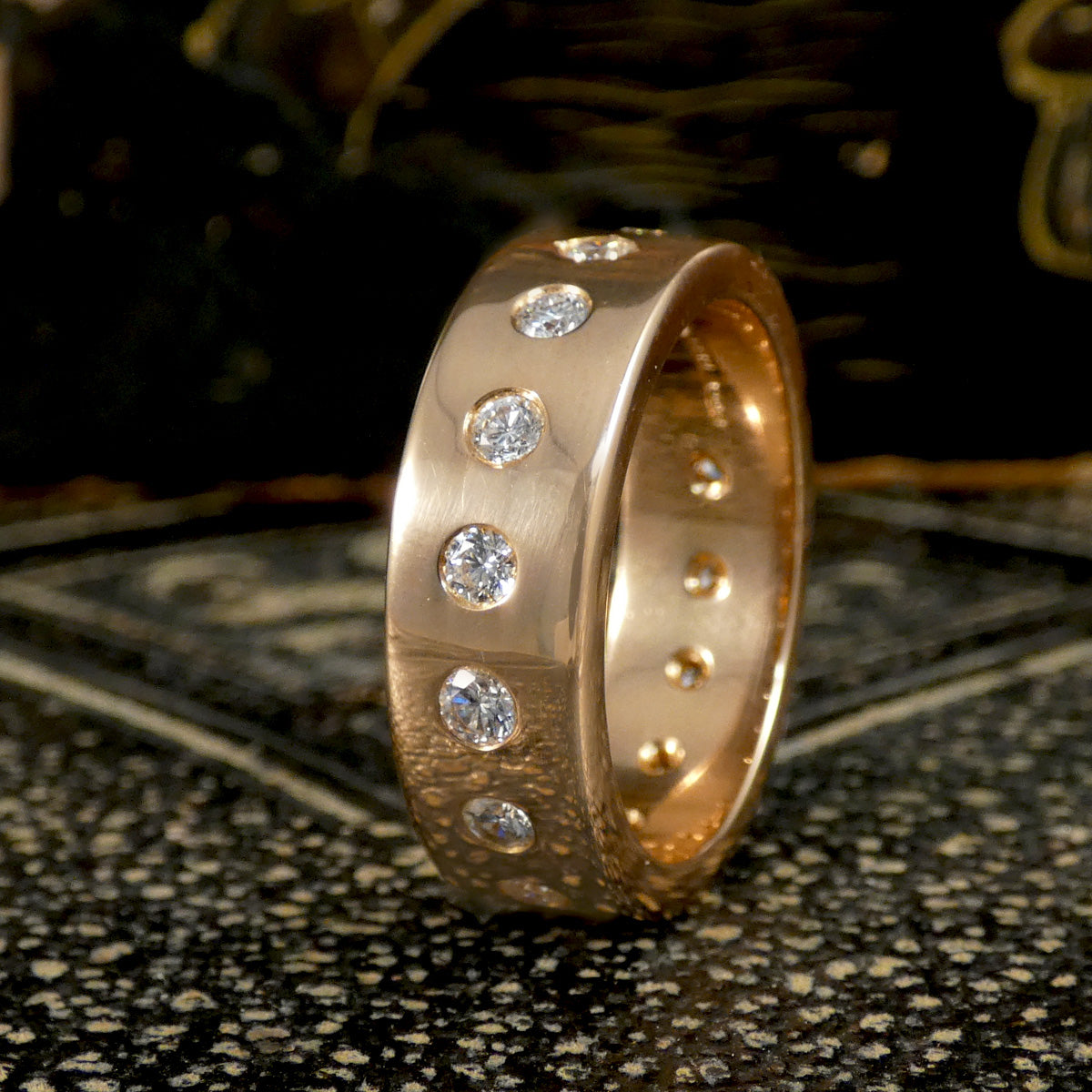 A bright and sparkly diamond set full band ring in 18ct rose gold