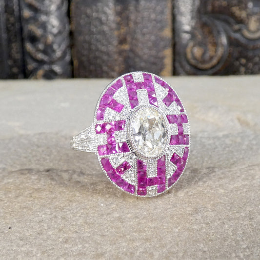 A gorgeous and intricate Ruby and Diamond geometric designed ring in Platinum.