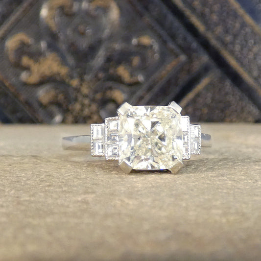 This gorgeous ring would make the perfect engagement ring, featuring a 2.01ct Cushioned Modified Brilliant Cut Diamond in the centre in a four claw setting with a GIA cert for professional grading and assessment.