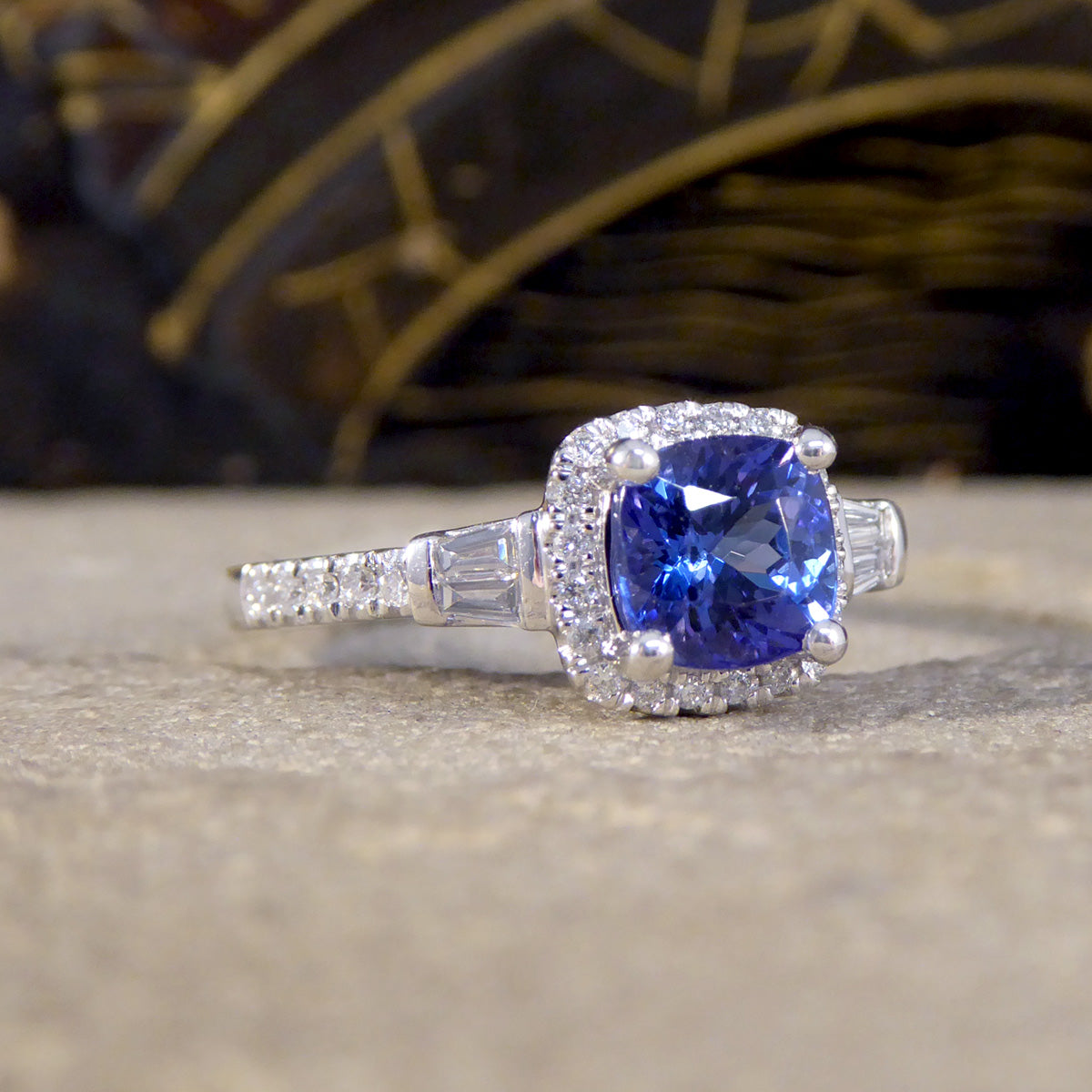 Cushion Cut Tanzanite and Diamond Cluster Ring with Tapered Baguette Shoulders in Platinum