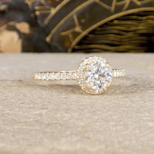 GIA Cert D Colour Diamond Halo Cluster Engagement Ring with Diamond Shoulders in 18ct Yellow Gold with a 0.72ct Diamond total matching very well in quality.