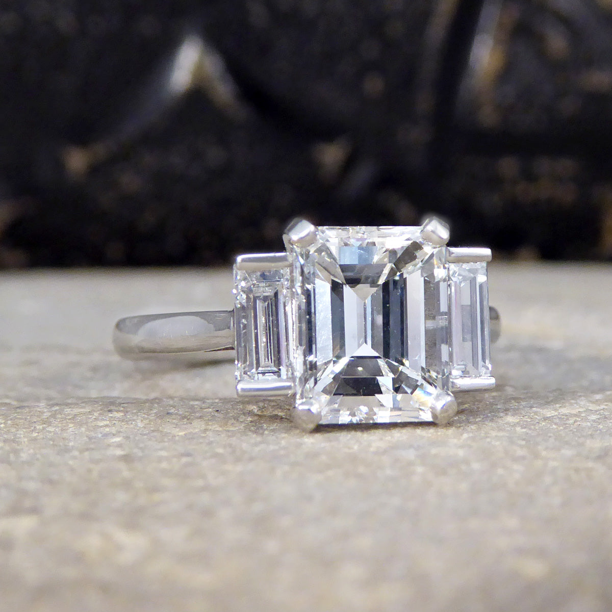 2.57ct Emerald and Baguette Cut Three Stone Ring in Platinum