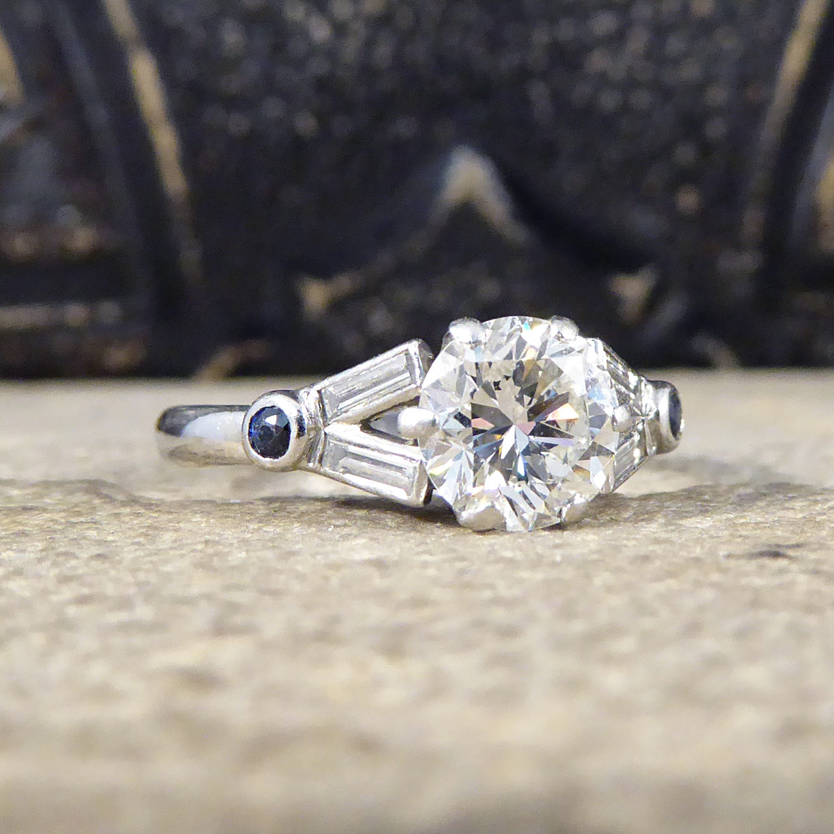 Art Deco 1.10ct Diamond Solitaire Engagement Ring with Diamond and Sapphire Shoulders in Platinum - Wharfedale Antiques