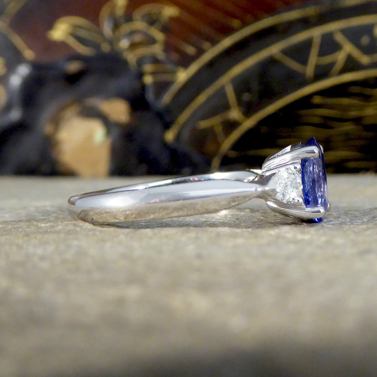 Oval Tanzanite and Pear Cut Diamond Three Stone Ring in Platinum - Wharfedale Antiques