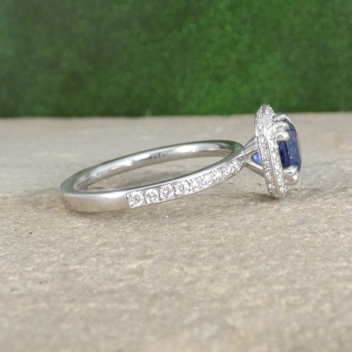 Sapphire and Diamond Halo Cluster Ring in Platinum with diamond shoulders