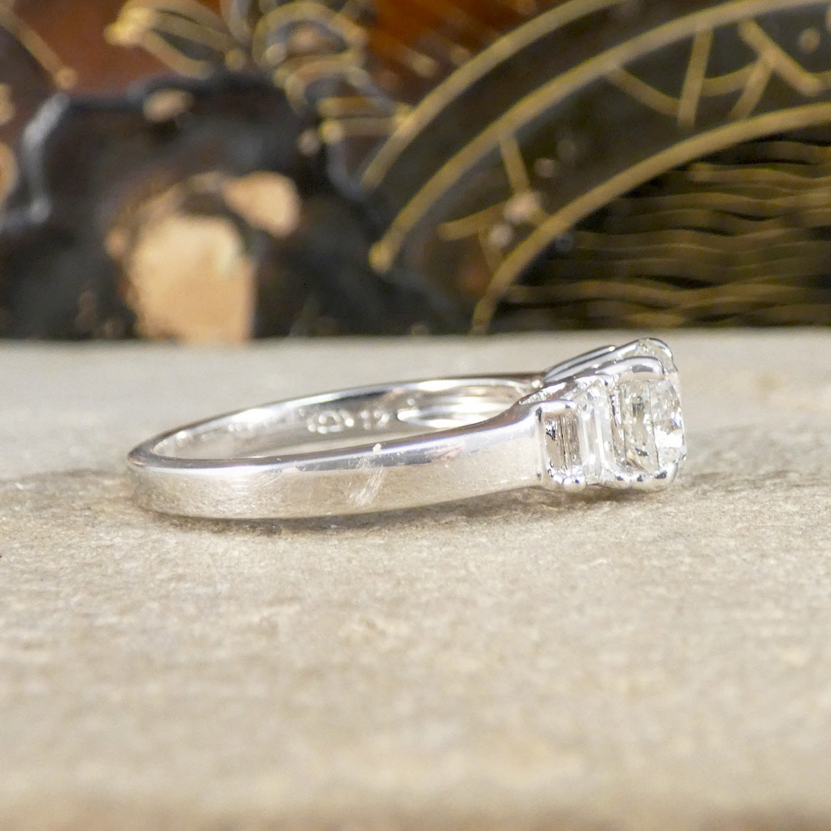 Side view of diamond ring with a chunky band.