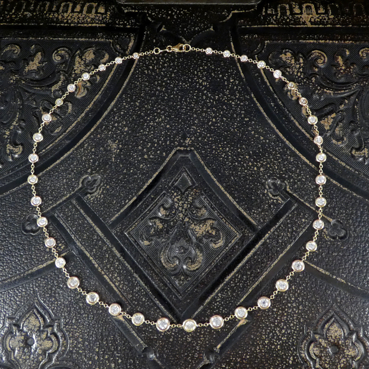 4.55ct Diamond Spectacle Set Spaced Necklace in 18ct Rose and Yellow Gold showing all links.
