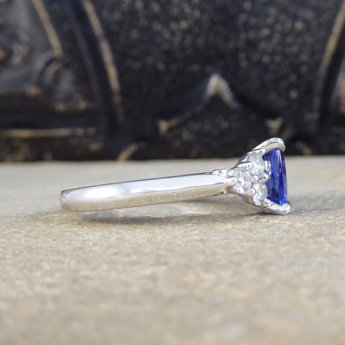 Vibrant 2.40ct Cushion Cut Tanzanite and Diamond Trio Set Shoulders in Platinum - Wharfedale Antiques