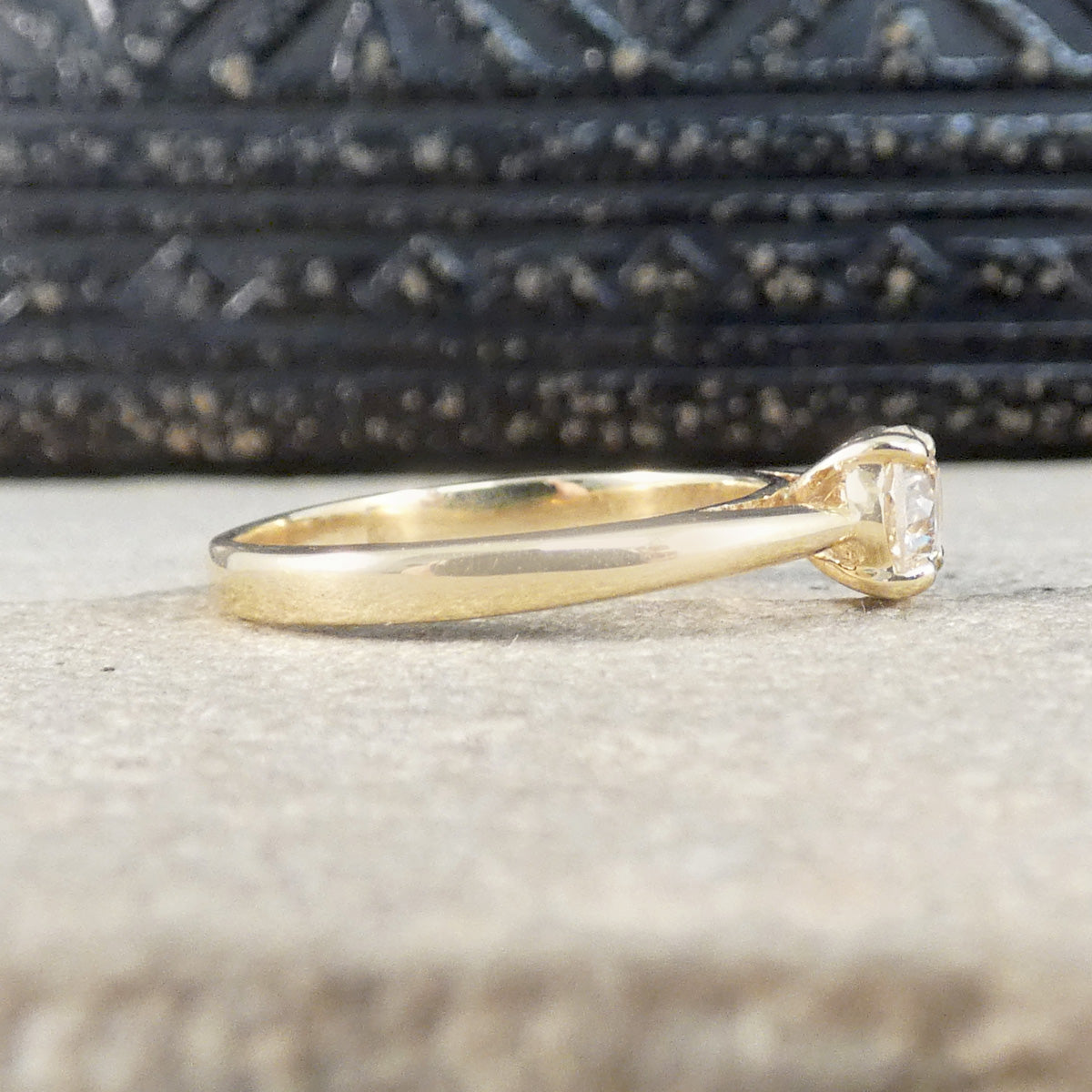 Side view of Old European Cut Diamond Solitaire Engagement Ring in Yellow Gold. Showing slightly tapered shoulder leading to the diamond.