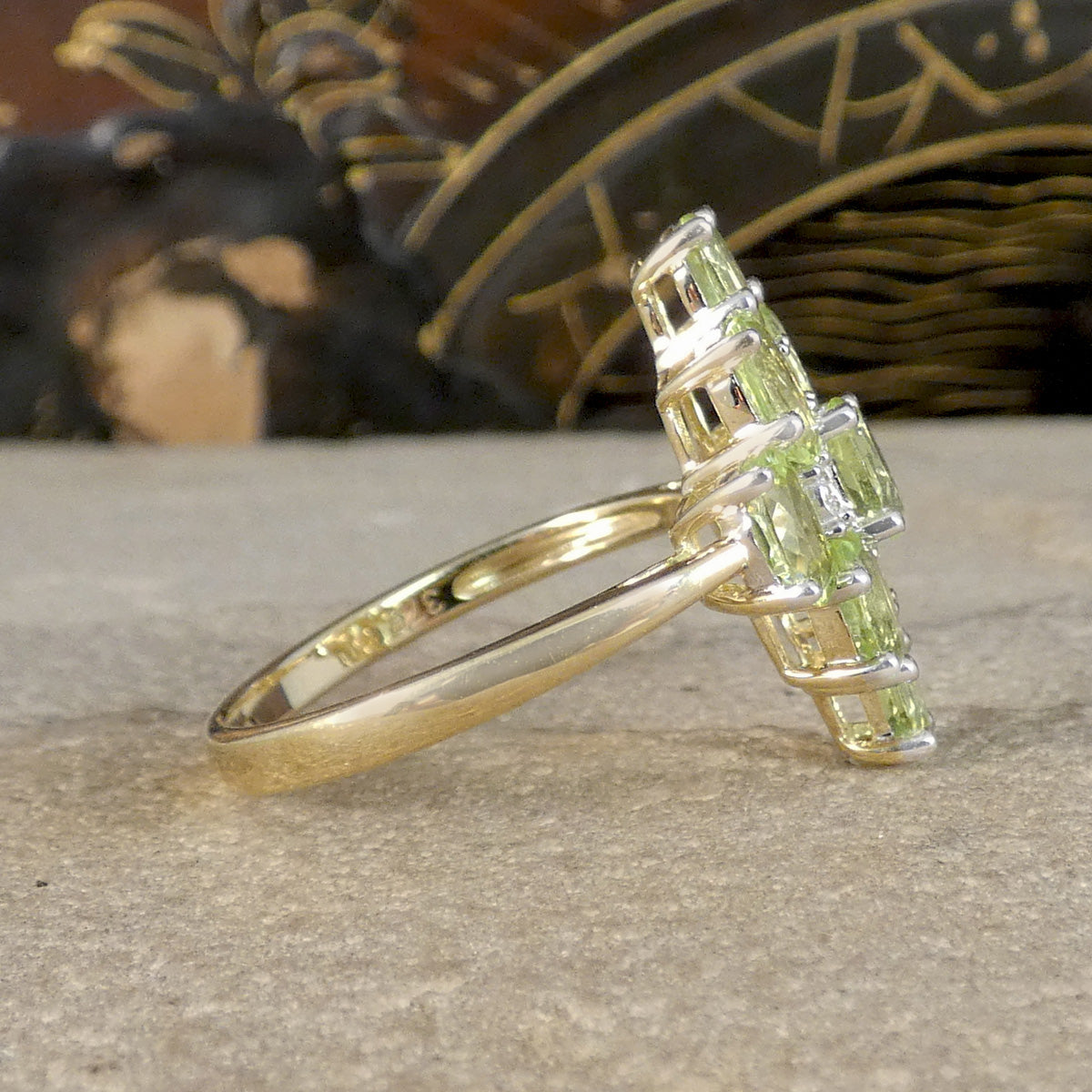 Side view of A bright and beautiful Peridot and Diamond Cluster Cocktail Dress Ring filly set in 9ct Yellow Gold