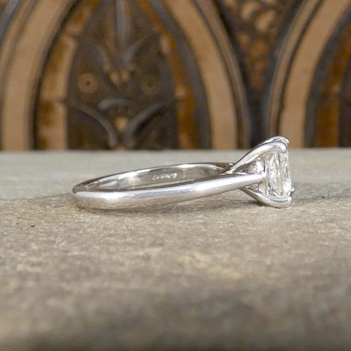 Side profile of Princess Cut Diamond solitaire with a slight tapered shoulder to accentuate the centre stone weighing just over a carat.