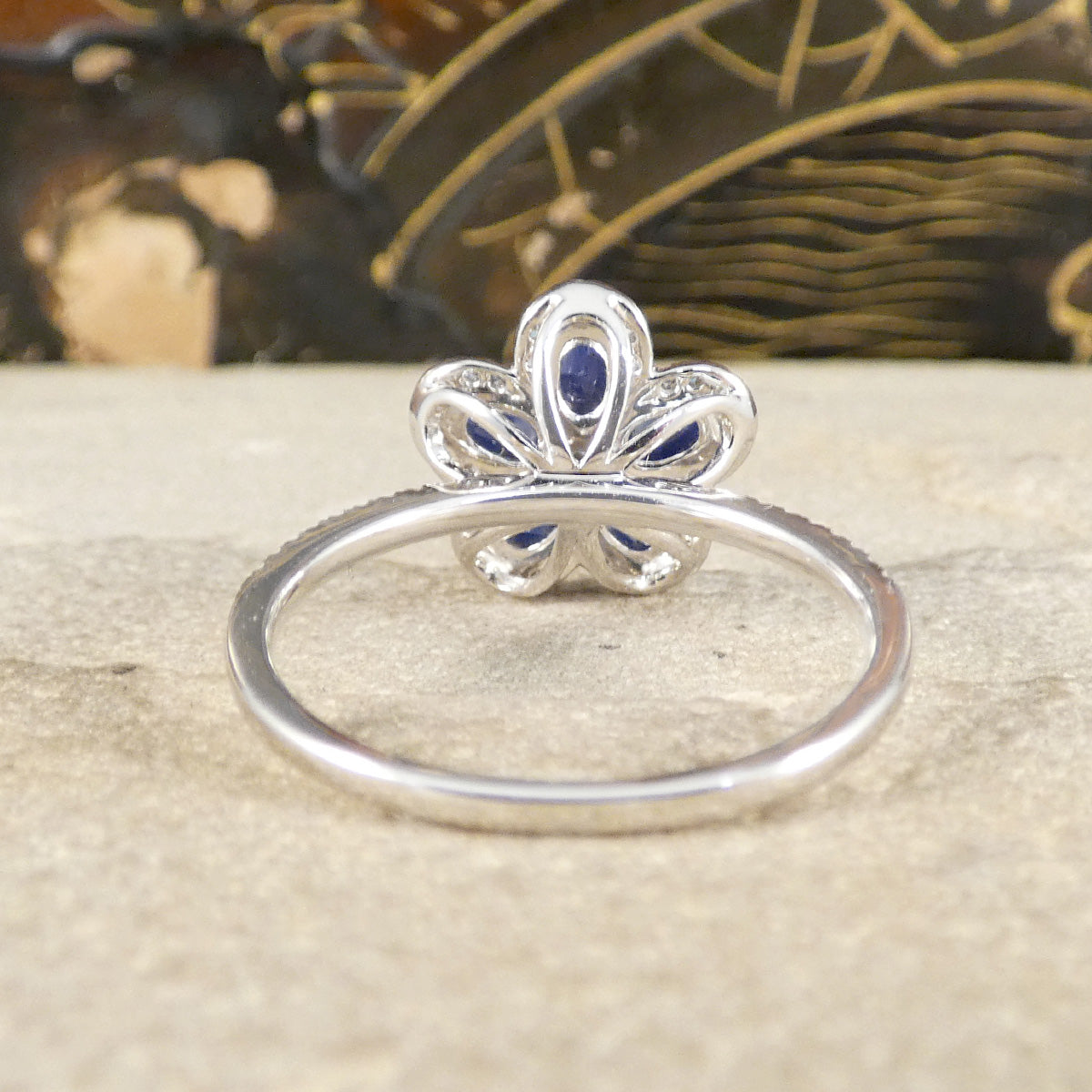 Back view of Diamond flower cluster ring in 18ct white gold.