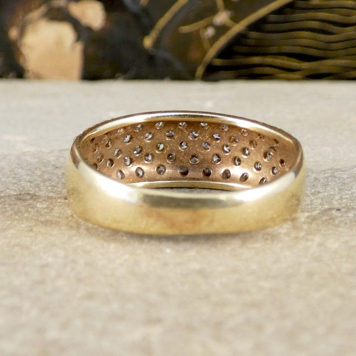 back view of diamond set ring in yellow gold